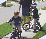 Photo of a family riding bicycles.